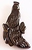 BP130 black bakelite peacock pin